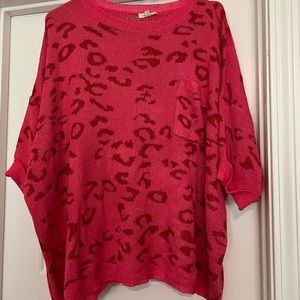 Very loose lightweight sweater short sleeve says medium but could fit xl!!